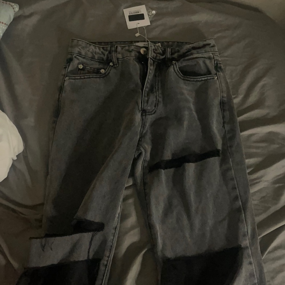 dark wash adika jeans never been worn and still have tags. size extra small.